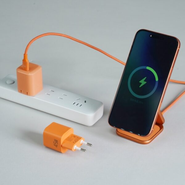 Portable GaN charger with foldable pins and modern cube-shaped design Portable GaN charger with foldable pins and modern cube-shaped design